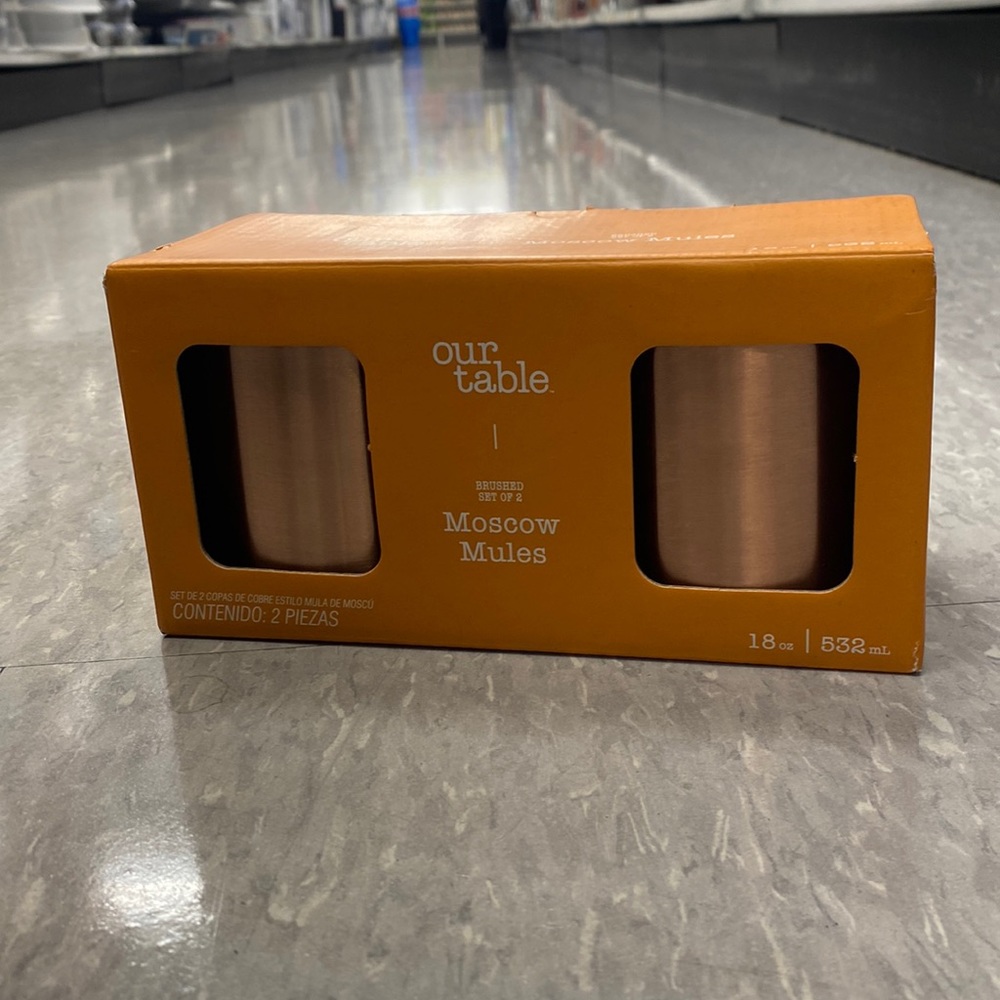 Brushed copper design moscow mules.